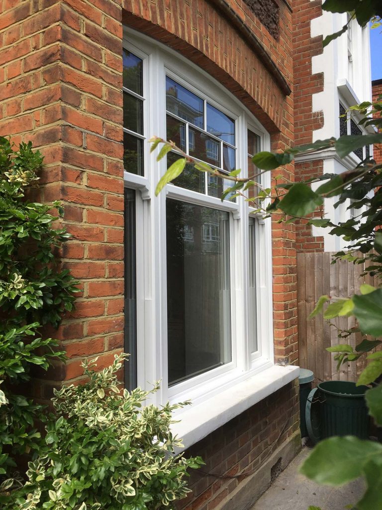 Edwardian sash window with white frame